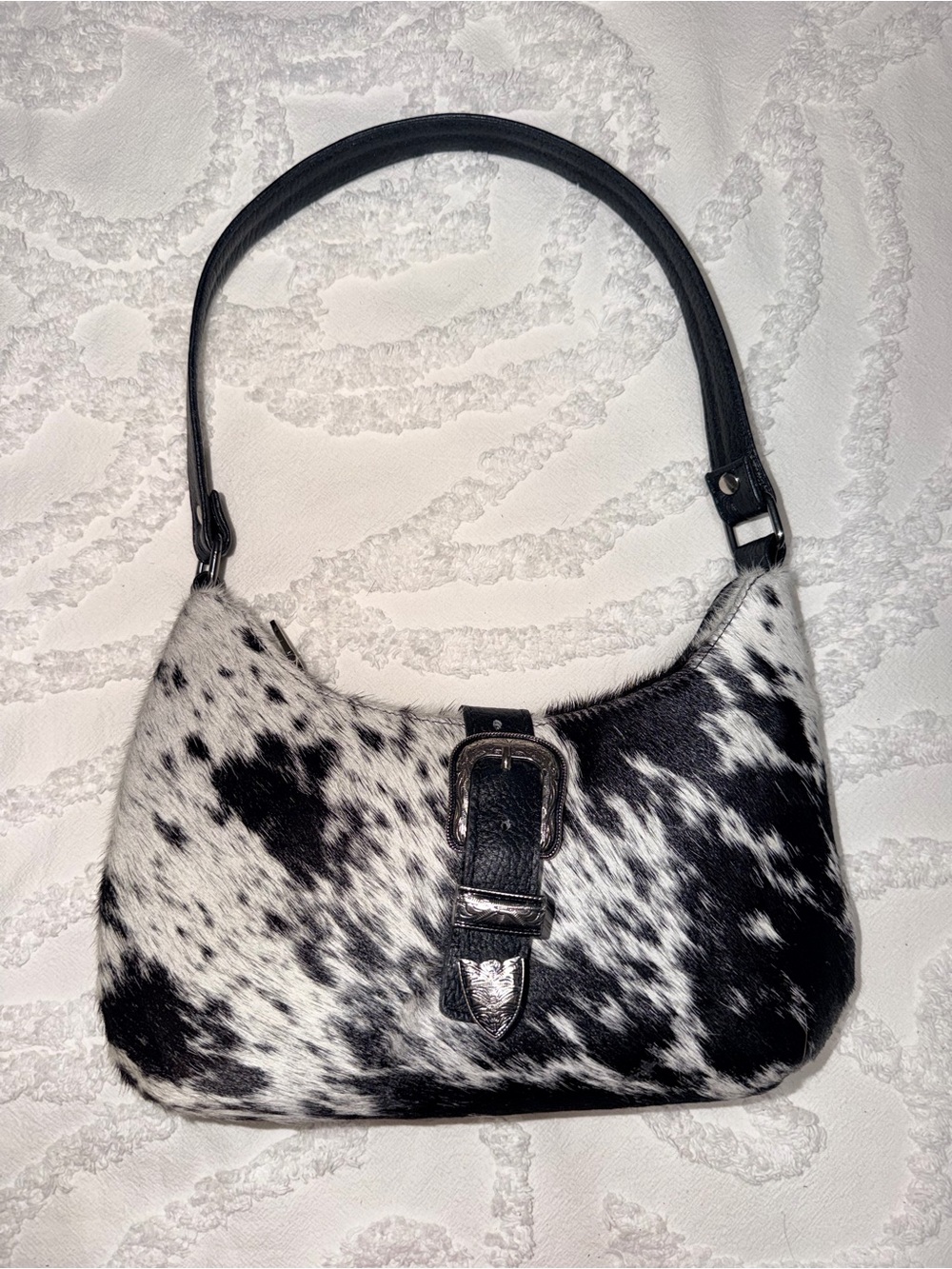 Black & White Cowhide Shoulder Bag with Buckle Accent